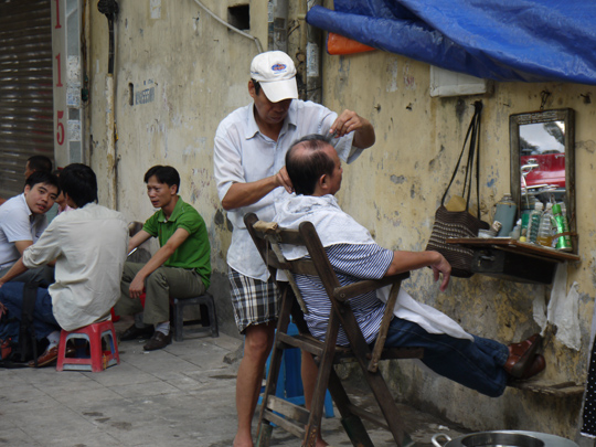 An outdoor hairdresser in Hanoi, Vietnam