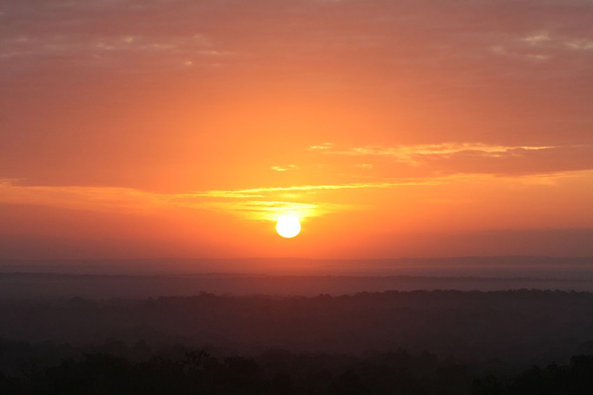  You won't soon forget watching the sun rise at Tikal. Photo courtesy Carsten B.