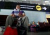 A man reads a Zika virus flyer from an information campaign by the Chilean Health Ministry at the departures area of Santiago’s international airport, Chile. Ivan Alvarado/Reuters