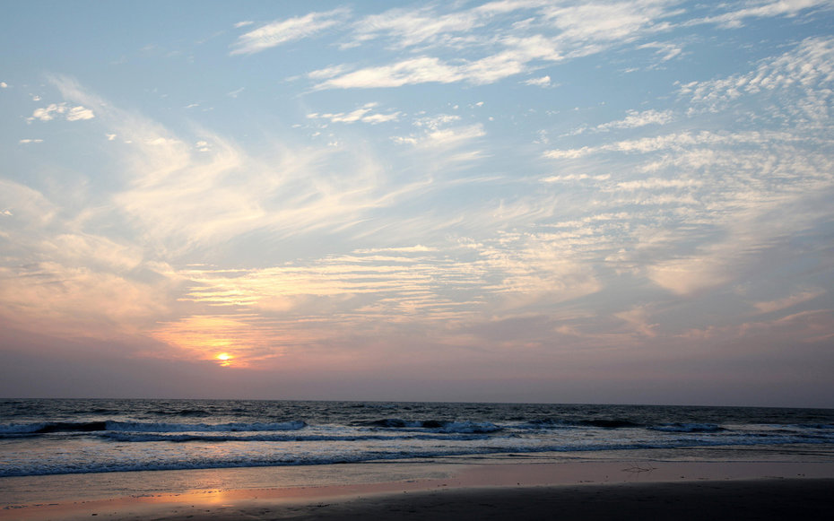 Sunset at ashwem beach ; Goa ; India. Credit Alamy