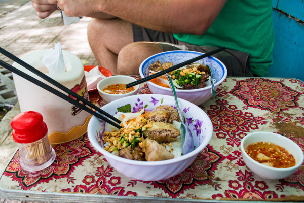 noodles with marinated char-grilled pork and egg rolls in Sai Gon