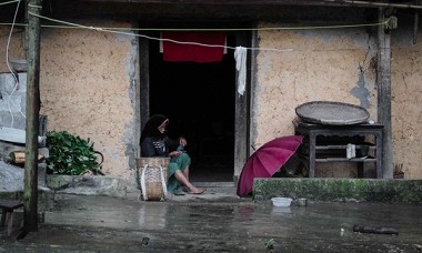 old woman preparing to work