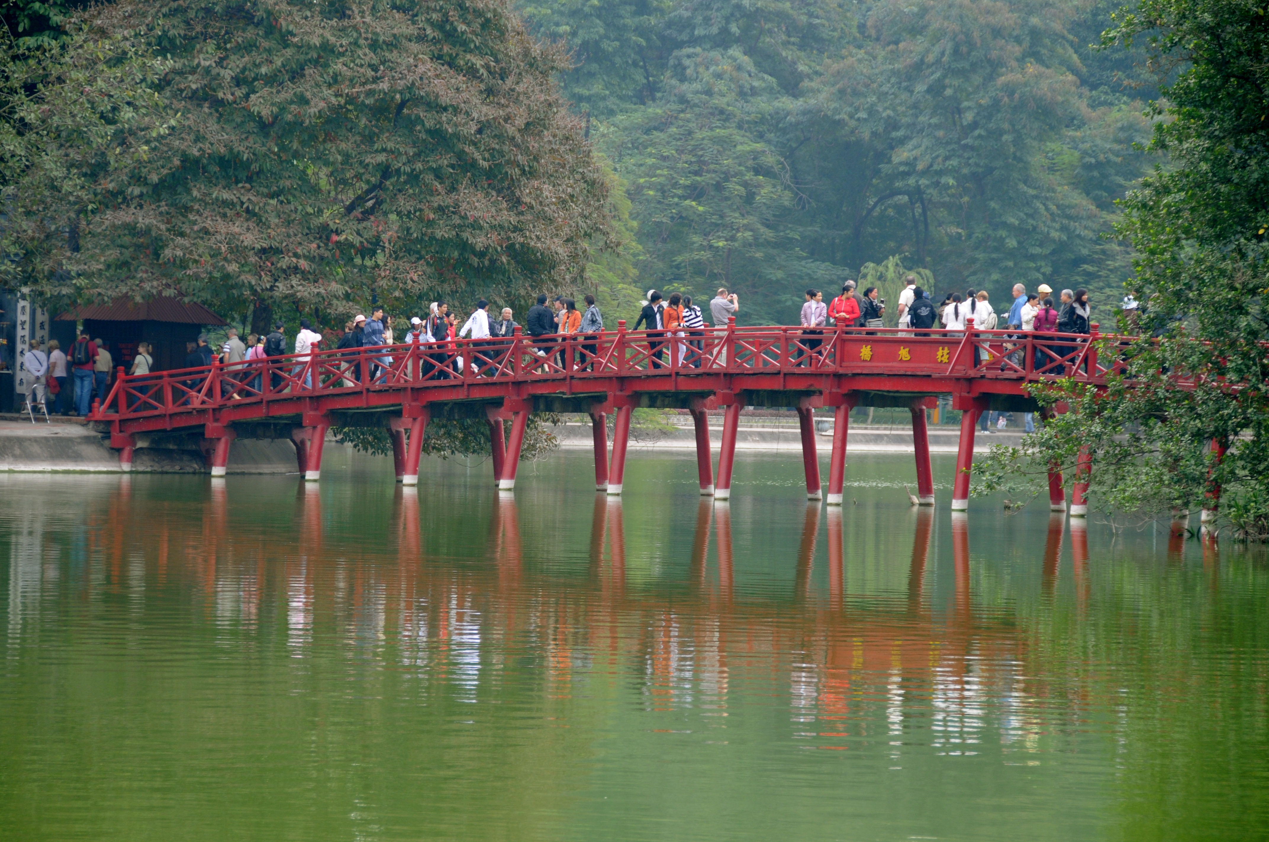 walking around hoan kiem lake sword lake hanoi vietnam the huc bridge ngoc son temple
