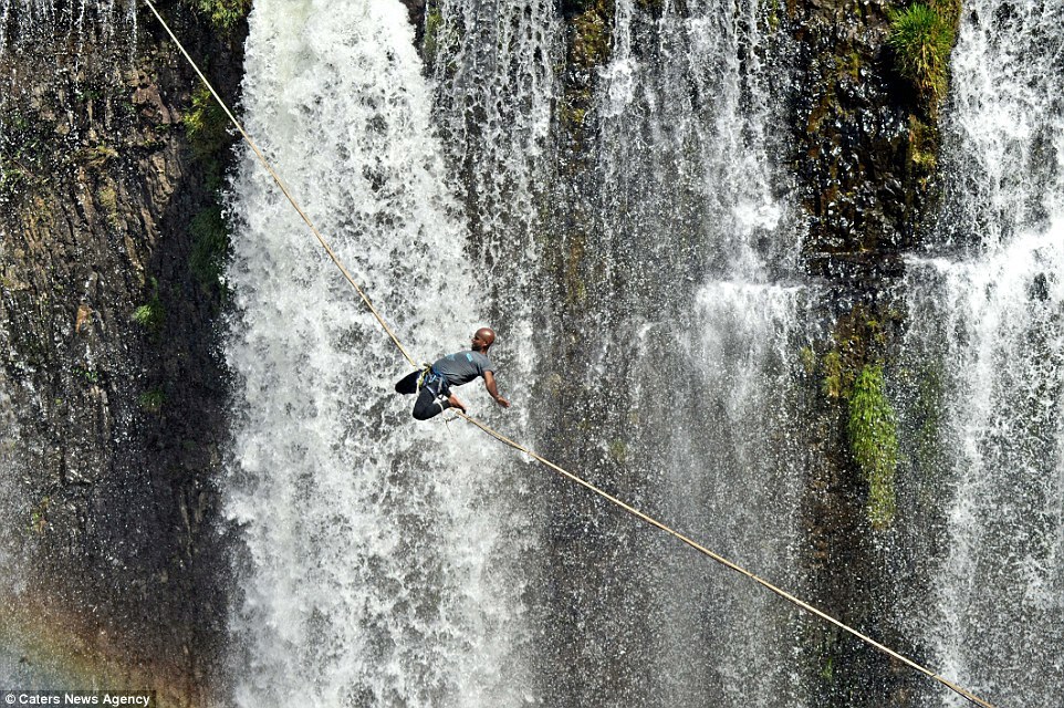 Reginaldo has practiced his technique over the two years of his highlining experience - always stretching and meditating beforehand. Image by Caters News Agency