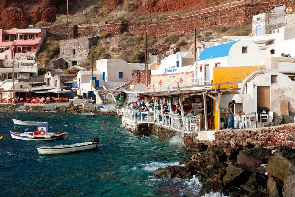 Restaurants in Ammoudi port. Image by Hackenberg ullstein bild - Getty Images - Caldera-edge settlements