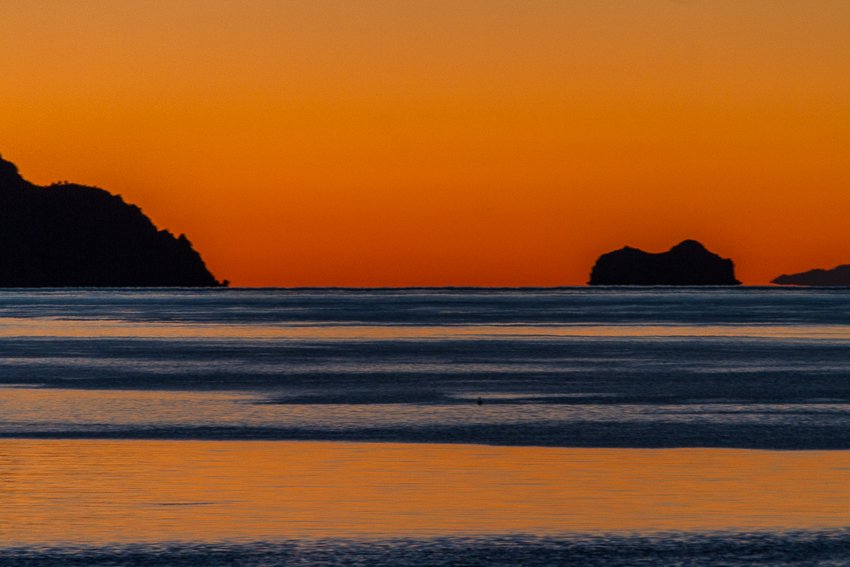 Reflection of orange sky on sea - Mexico