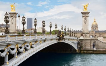 Visiting Paris to hear the most famous bridges in Paris tell stories Pont Alexandre III at night