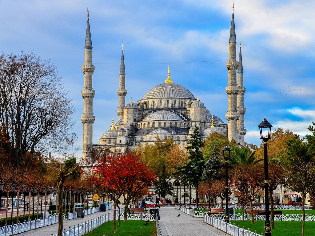 blue-mosque-sultan-ahmed-mosque-istanbul-turkey-blue-mosque-mosque-of-sultan-ahmet-istanbul-turkey-lamps-tree-square - Living + Nomads – Travel tips, Guides, News & Information!
