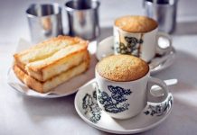 Typical Ipoh breakfast with white coffee and toasts