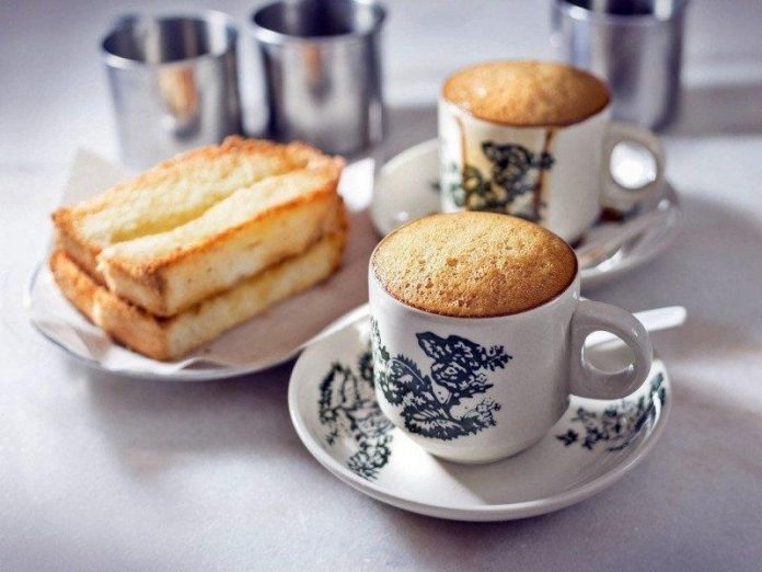 Typical Ipoh breakfast with white coffee and toasts