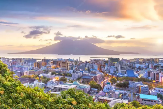 kagoshima-city-downtown-skyline-cityscape-with-sakurajima-volcano-kyushu-japan-sunset_255553-2354